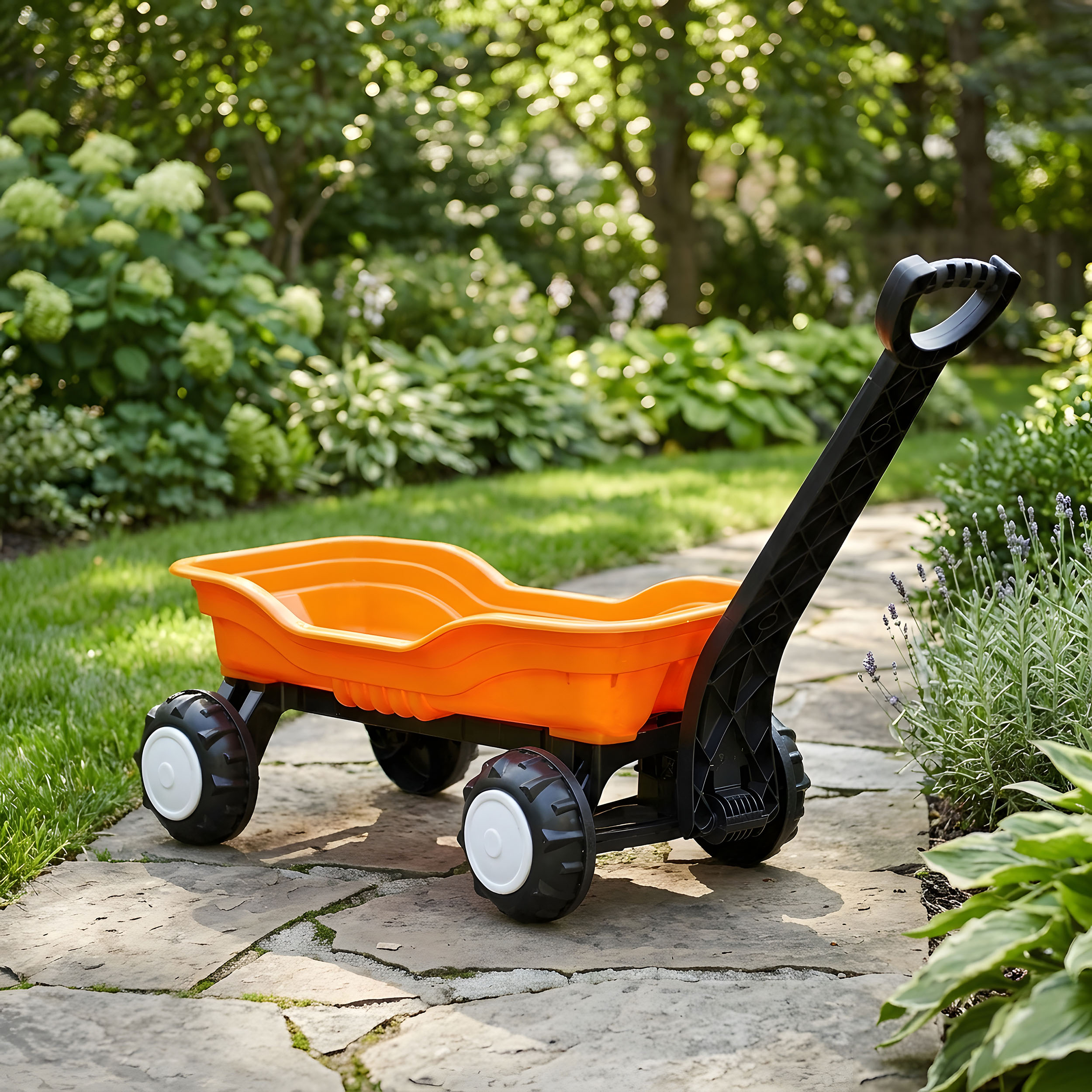 Children's toy wagon placed in the middle of a cobblestone path in a beautiful lush green park.